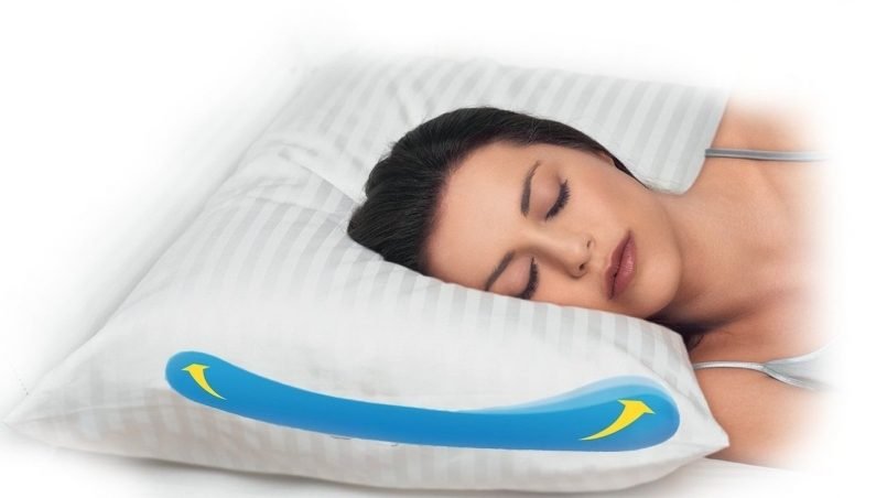 Woman sleeping on her side on a firm pillow