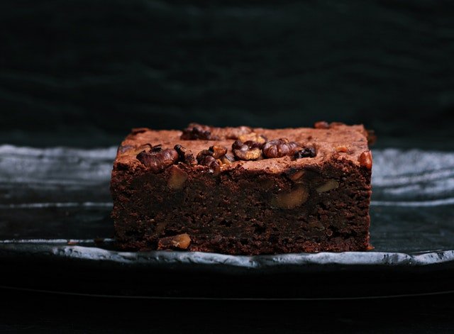 A chocolate fudge cake with nuts