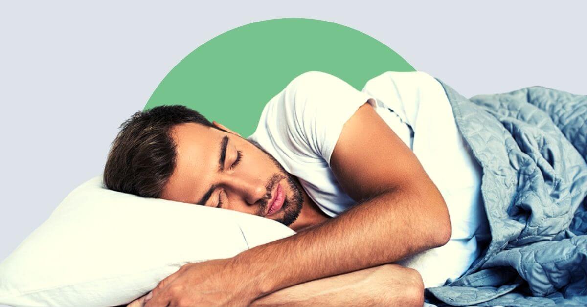 A young man sleeping on a plush supportive pillow